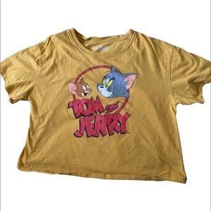 A Tom and Jerry shirt. It's a 3 years old and only worn 2 times.